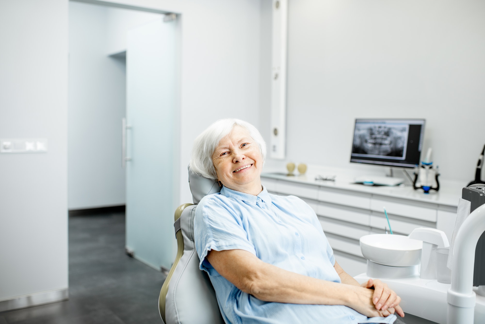 Portrait of a senior woman at the dental office